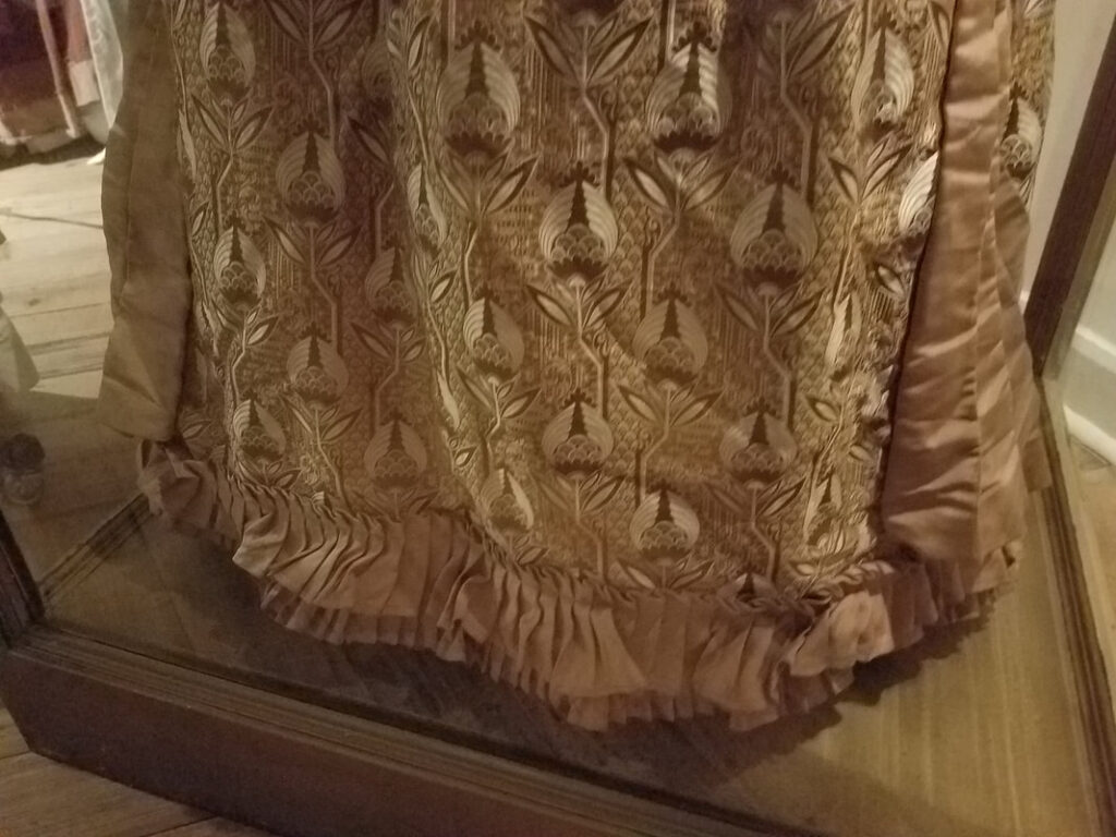Close-up of patterned Victorian skirt fabric